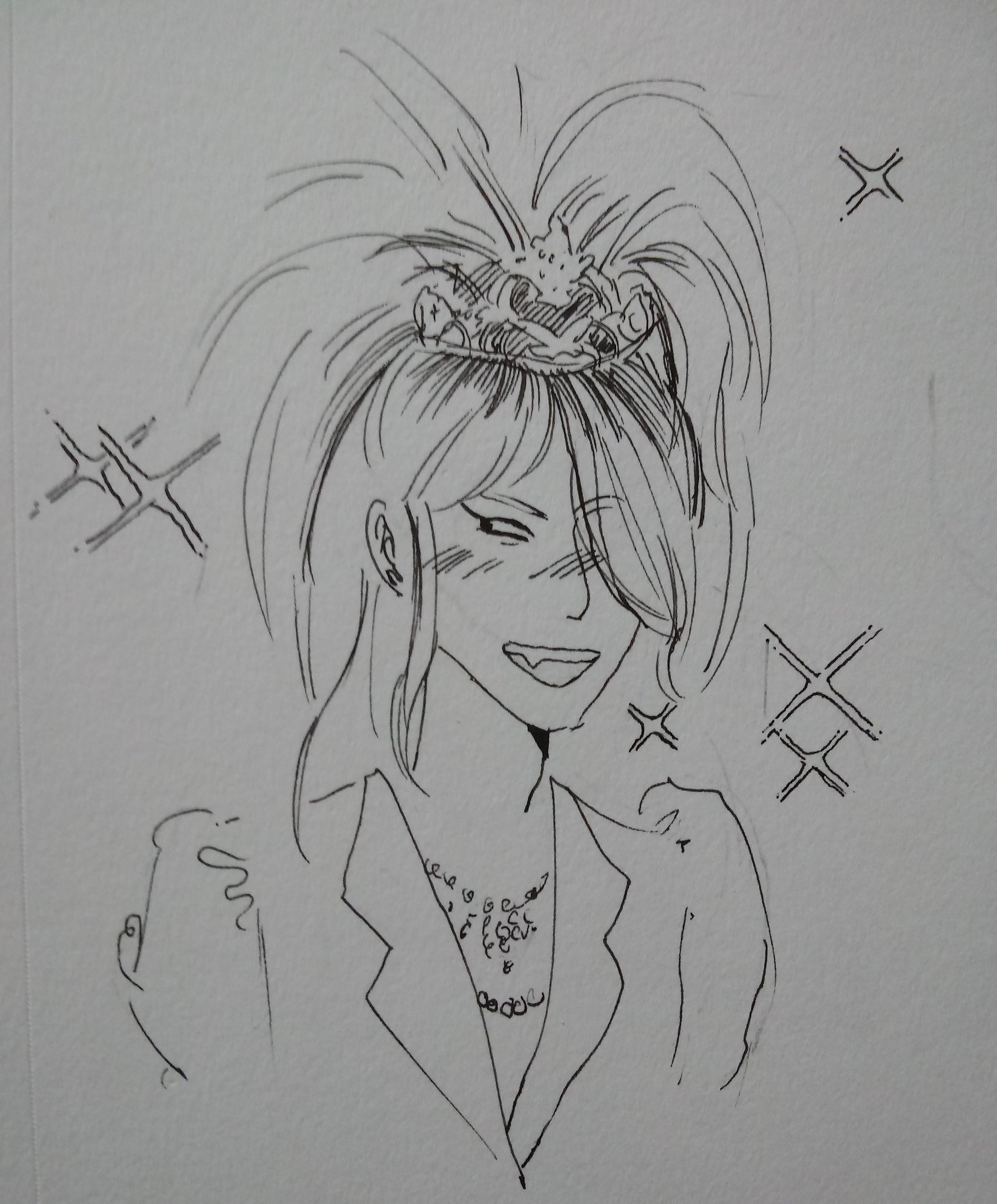 A black pen drawing on white paper. Yoshiki smiling with his canine tooth emphasized. He is wearing a tiara and a poofy sleeved dress. There are sparkles around him.